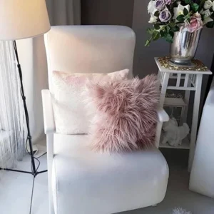 Long-pile cushion cover with lining.